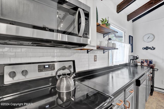 kitchen with open shelves, tasteful backsplash, stainless steel counters, lofted ceiling with beams, and appliances with stainless steel finishes