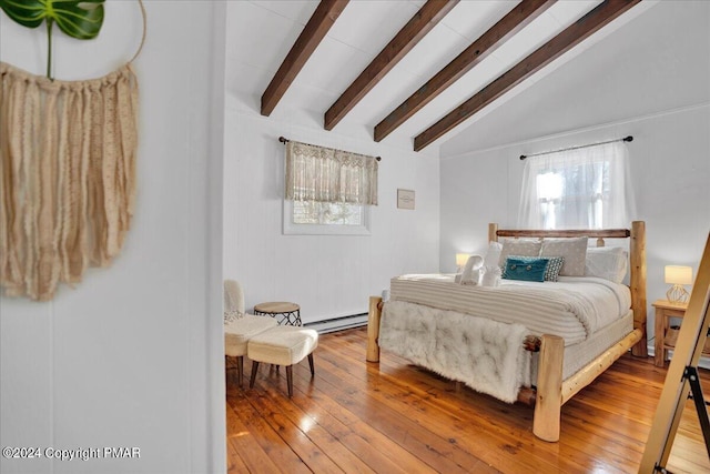 bedroom with a baseboard radiator, vaulted ceiling with beams, and hardwood / wood-style flooring