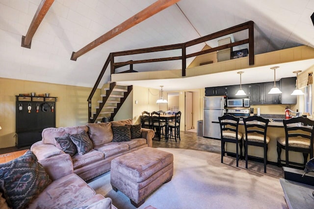 173 Pontiac Path, Pocono Lake, PA 18347 - living area featuring stairway, beam ceiling, and high vaulted ceiling