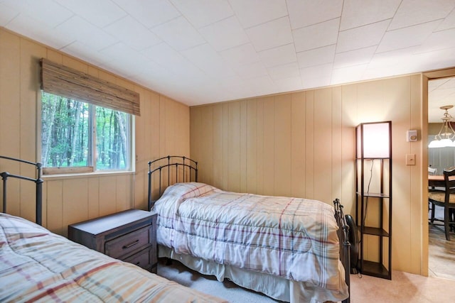 173 Pontiac Path, Pocono Lake, PA 18347 - bedroom with carpet floors and wood walls