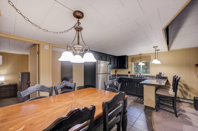 173 Pontiac Path, Pocono Lake, PA 18347 - dining space featuring wood walls