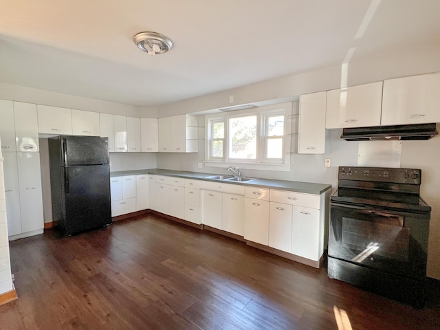 kitchen with black appliances, under cabinet range hood, white cabinets, and dark wood-style flooring