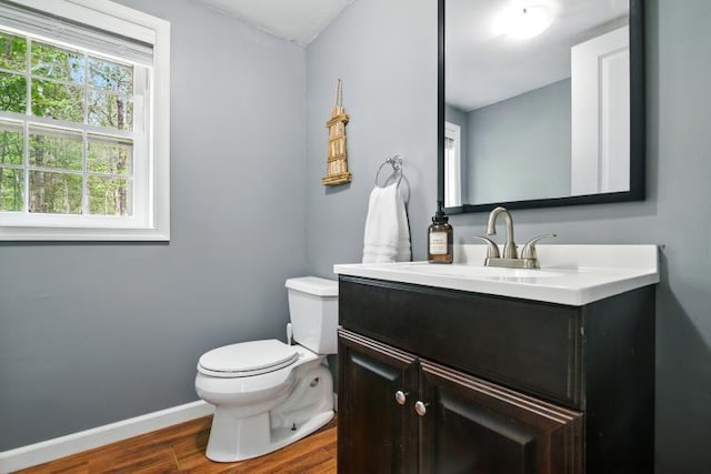 1042 Middleridge Dr, Gouldsboro, PA 18424 - half bathroom featuring wood finished floors and vanity