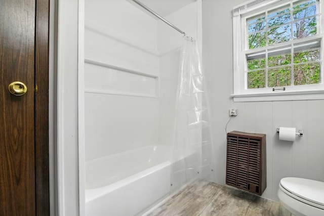 1042 Middleridge Dr, Gouldsboro, PA 18424 - full bath with shower / bath combination with curtain and wood finished floors