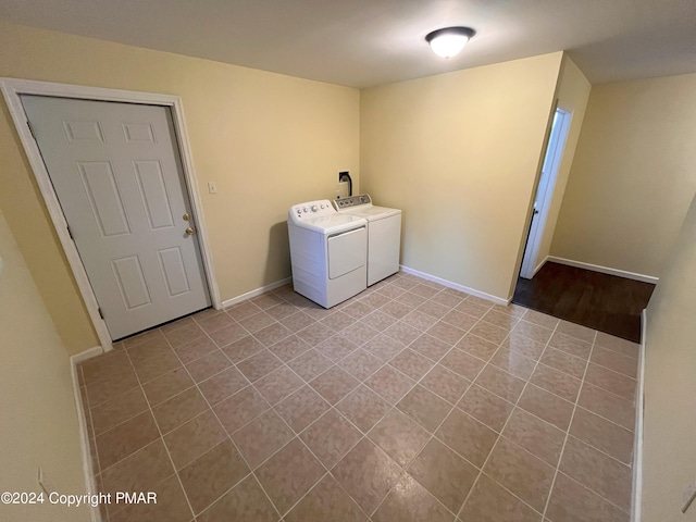 laundry room featuring washer and clothes dryer