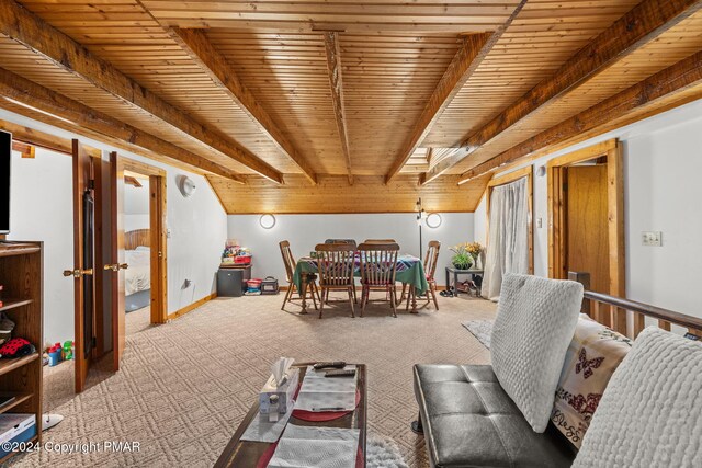 living room with beamed ceiling, wooden ceiling, and carpet floors