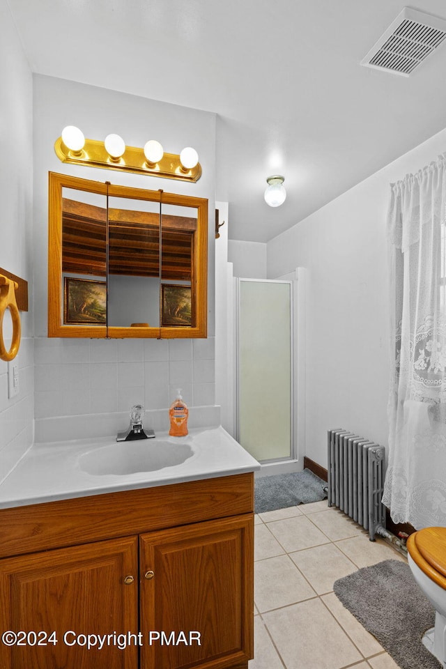 full bath featuring vanity, visible vents, radiator heating unit, decorative backsplash, and a shower stall