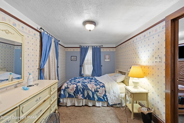 carpeted bedroom with a textured ceiling and wallpapered walls