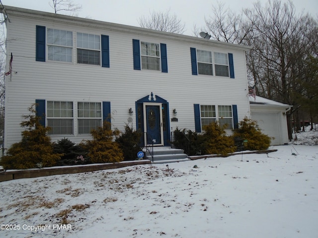 colonial-style house with a garage