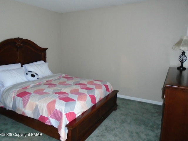 bedroom featuring carpet floors and baseboards