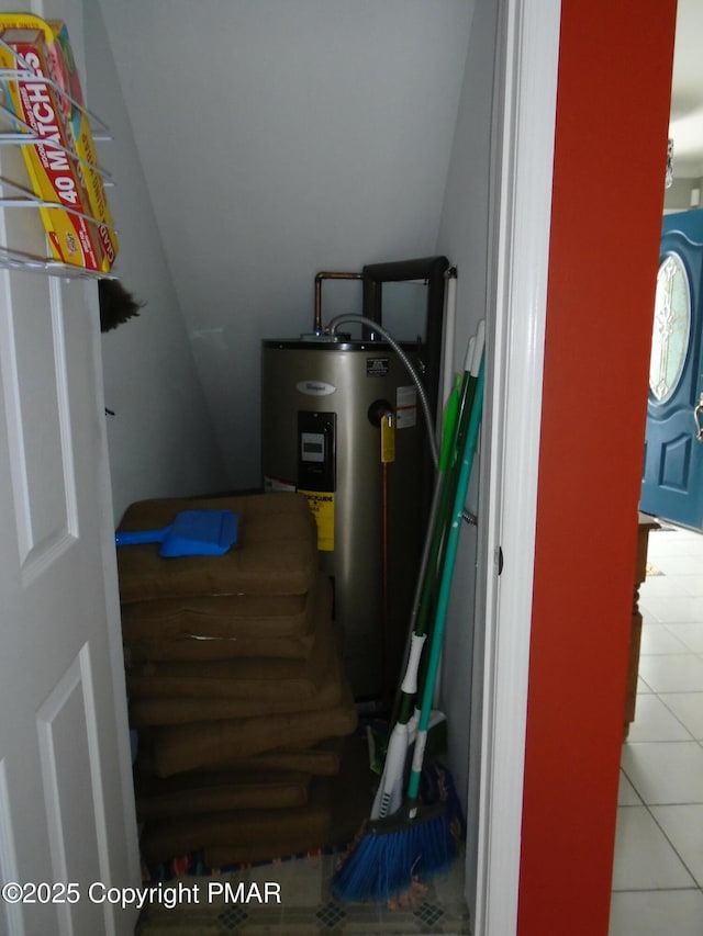 utility room with water heater