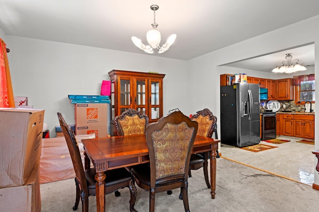 60 Arbutus Ln, East Stroudsburg, PA 18302 - dining room with a chandelier and light carpet