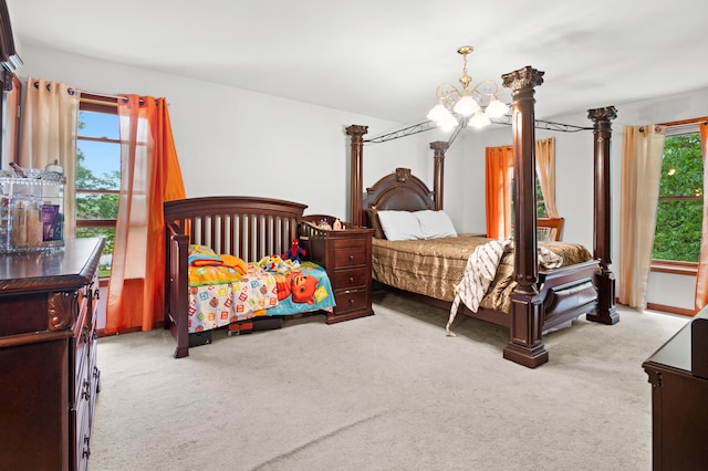 60 Arbutus Ln, East Stroudsburg, PA 18302 - bedroom featuring carpet and a chandelier
