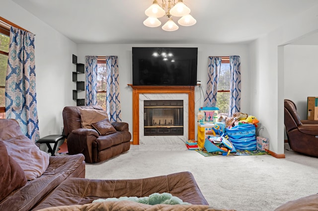 60 Arbutus Ln, East Stroudsburg, PA 18302 - carpeted living area with a chandelier and a premium fireplace