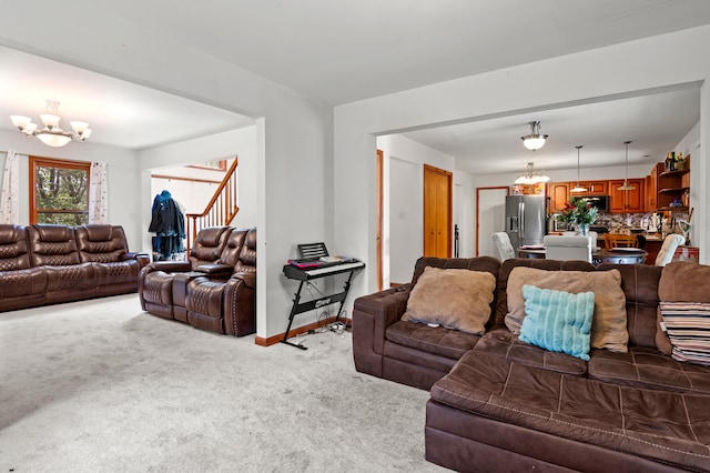 60 Arbutus Ln, East Stroudsburg, PA 18302 - carpeted living area featuring a chandelier and stairs