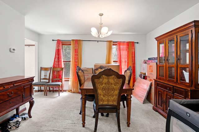 60 Arbutus Ln, East Stroudsburg, PA 18302 - dining space featuring a chandelier, plenty of natural light, and light carpet