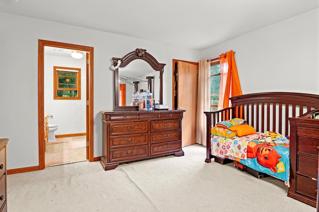 60 Arbutus Ln, East Stroudsburg, PA 18302 - bedroom with light carpet and connected bathroom