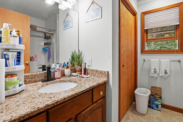 60 Arbutus Ln, East Stroudsburg, PA 18302 - bathroom featuring vanity, a shower with shower door, and tile patterned floors