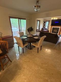 60 Arbutus Ln, East Stroudsburg, PA 18302 - dining space with a fireplace