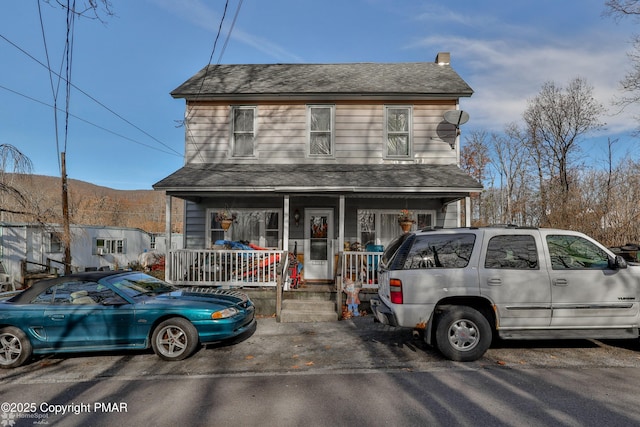 3310 Hazen Ave, Roseto, PA 18013 - view of front of home with a porch and a chimney