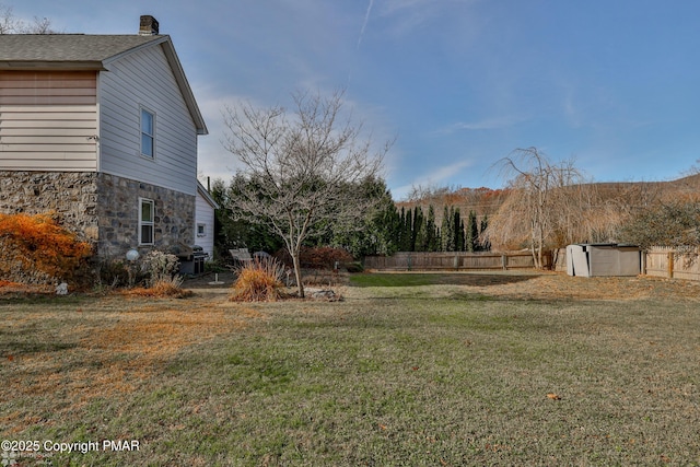3310 Hazen Ave, Roseto, PA 18013 - view of yard featuring fence, an outdoor structure, and a storage unit