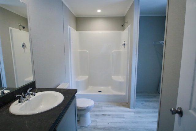 132 Spruce St, Greentown, PA 18426 - full bathroom with a shower, wood finished floors, vanity, and toilet