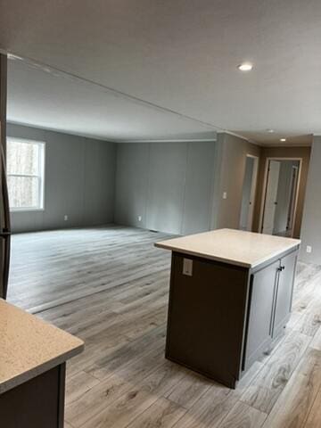 132 Spruce St, Greentown, PA 18426 - kitchen with light wood-style flooring, light countertops, a kitchen island, recessed lighting, and open floor plan