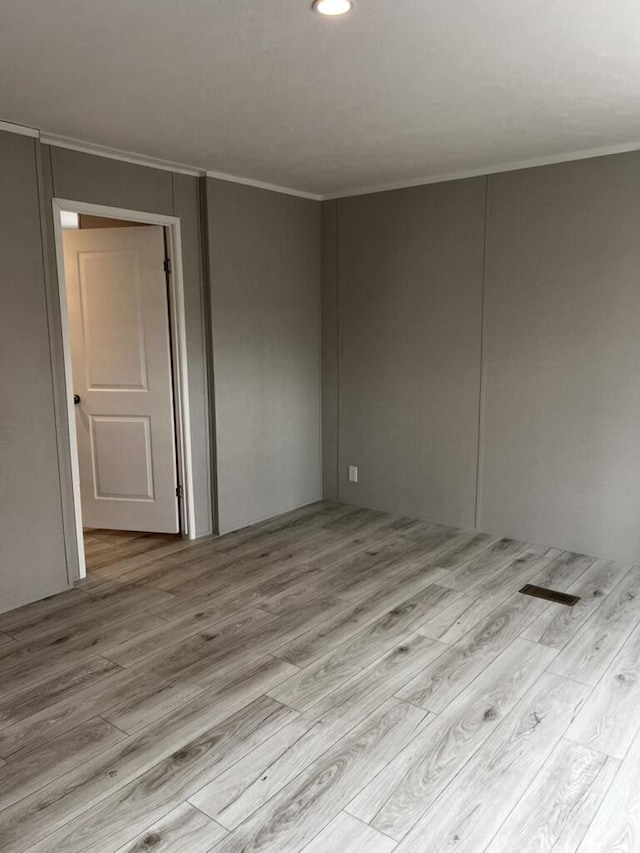 132 Spruce St, Greentown, PA 18426 - empty room featuring wood finished floors, crown molding, and recessed lighting