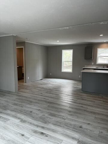 132 Spruce St, Greentown, PA 18426 - unfurnished living room with plenty of natural light, wood finished floors, and recessed lighting