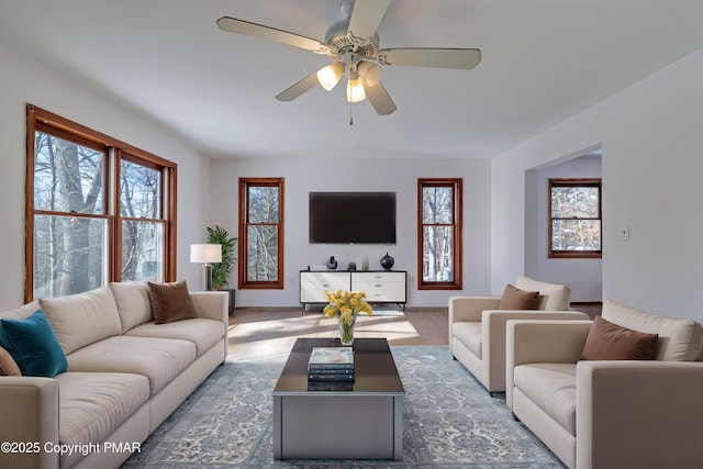 living room with ceiling fan