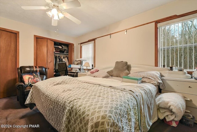 bedroom with carpet floors and a ceiling fan