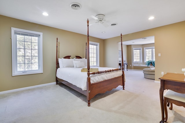 bedroom with visible vents, baseboards, and carpet