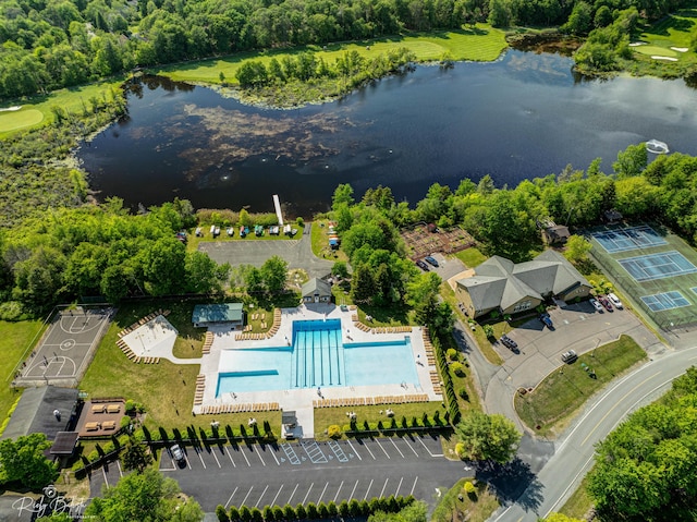 birds eye view of property with a water view