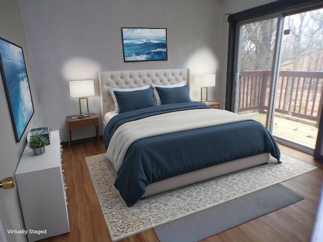 1292 Brentwood Dr, East Stroudsburg, PA 18301 - bedroom with access to outside and wood finished floors