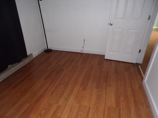 1292 Brentwood Dr, East Stroudsburg, PA 18301 - empty room featuring wood finished floors and baseboards
