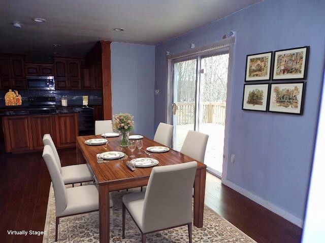 1292 Brentwood Dr, East Stroudsburg, PA 18301 - dining area with dark wood-type flooring and baseboards