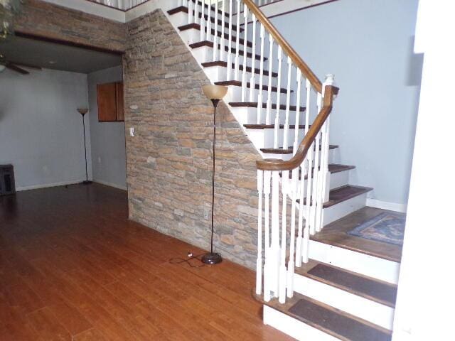 1292 Brentwood Dr, East Stroudsburg, PA 18301 - stairway featuring wood finished floors and baseboards