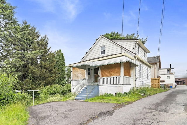 104 Serling St, Dupont, PA 18641 - view of front of property featuring covered porch