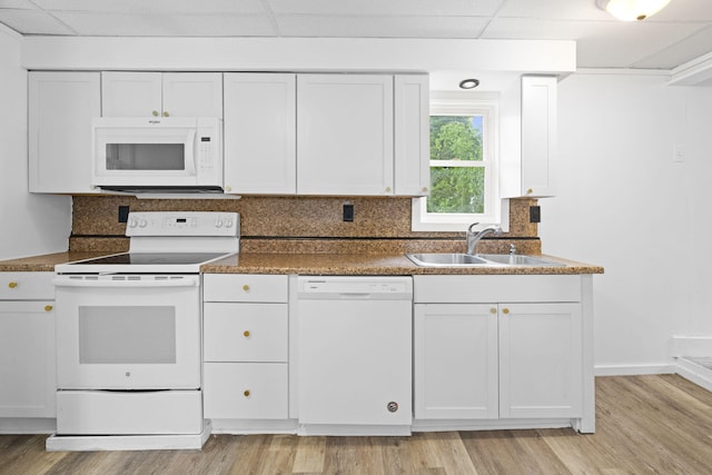 104 Serling St, Dupont, PA 18641 - kitchen with white appliances, a sink, white cabinetry, backsplash, and light wood-style flooring