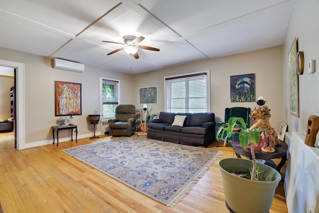 5245 Glenbrook Rd, Stroudsburg, PA 18360 - living area featuring an AC wall unit, ceiling fan, wood finished floors, and baseboards