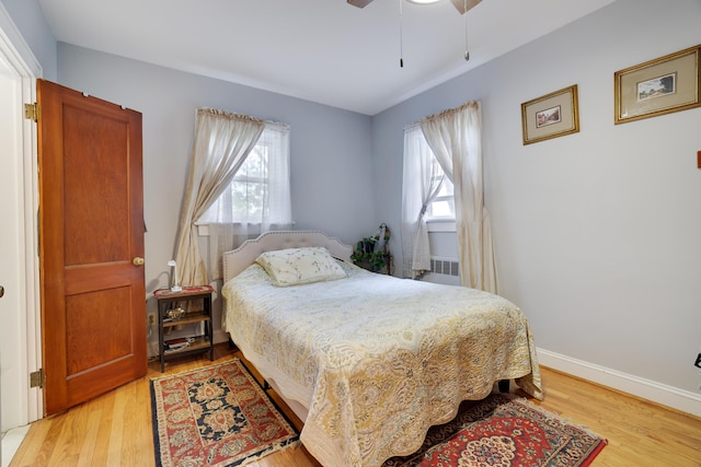 5245 Glenbrook Rd, Stroudsburg, PA 18360 - bedroom with multiple windows, light wood-style floors, baseboards, and a ceiling fan