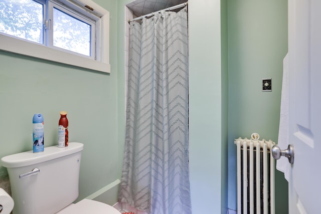 5245 Glenbrook Rd, Stroudsburg, PA 18360 - bathroom featuring radiator, toilet, and curtained shower
