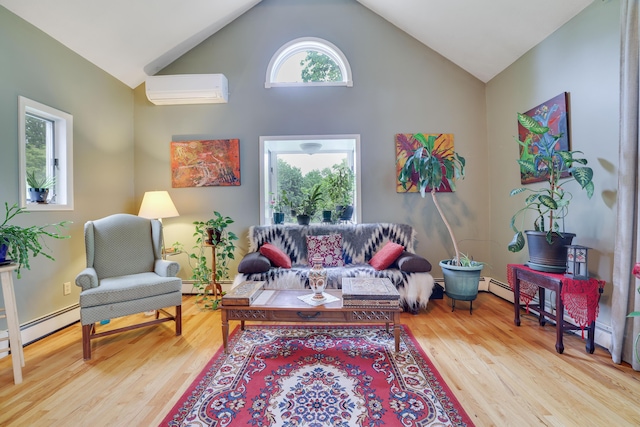 5245 Glenbrook Rd, Stroudsburg, PA 18360 - living room featuring a wall mounted air conditioner, high vaulted ceiling, wood finished floors, and a baseboard heating unit