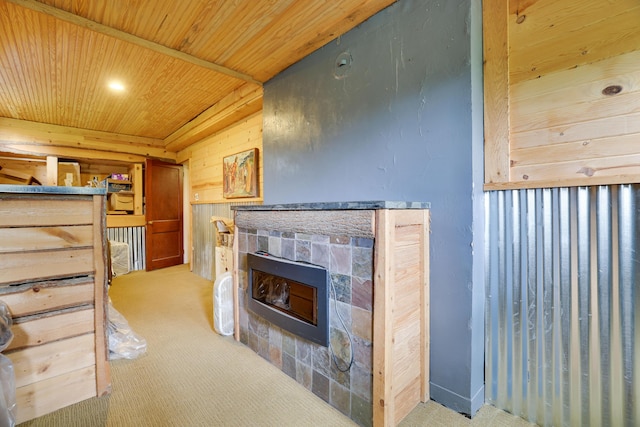 5245 Glenbrook Rd, Stroudsburg, PA 18360 - carpeted living room with wood ceiling, a fireplace, wooden walls, and recessed lighting