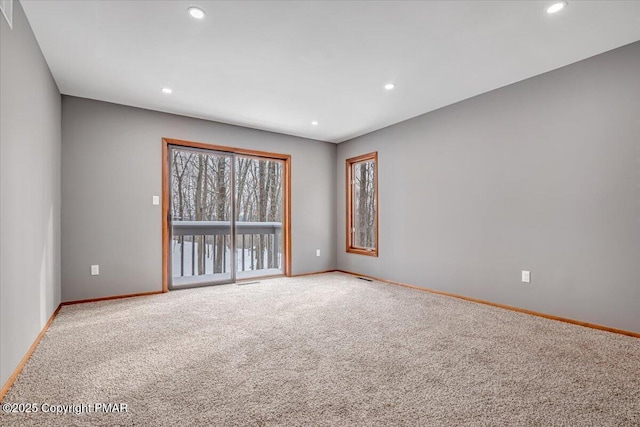 empty room featuring carpet flooring