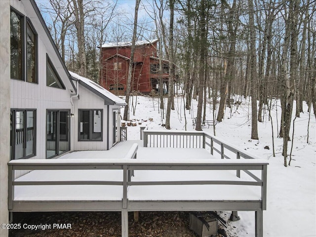 view of snow covered deck