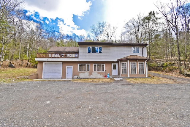 982 Long Ridge Rd, Hawley, PA 18428 - view of front facade featuring an attached garage and dirt driveway