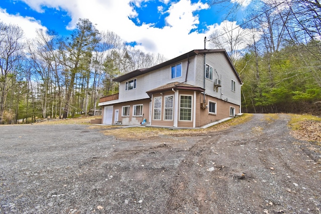 982 Long Ridge Rd, Hawley, PA 18428 - exterior space with driveway and an attached garage