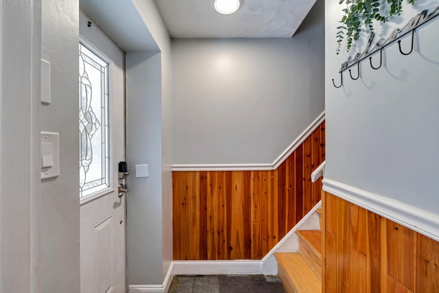 982 Long Ridge Rd, Hawley, PA 18428 - foyer entrance featuring wooden walls, stairs, and wainscoting