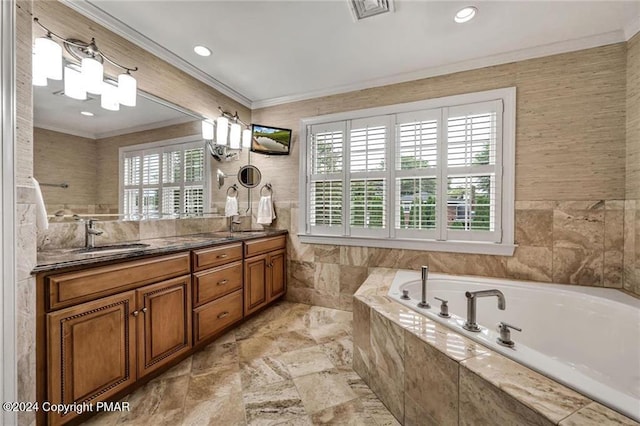 187 Eisenhart Blvd, Bangor, PA 18013 - full bathroom with crown molding, double vanity, a garden tub, tile walls, and recessed lighting